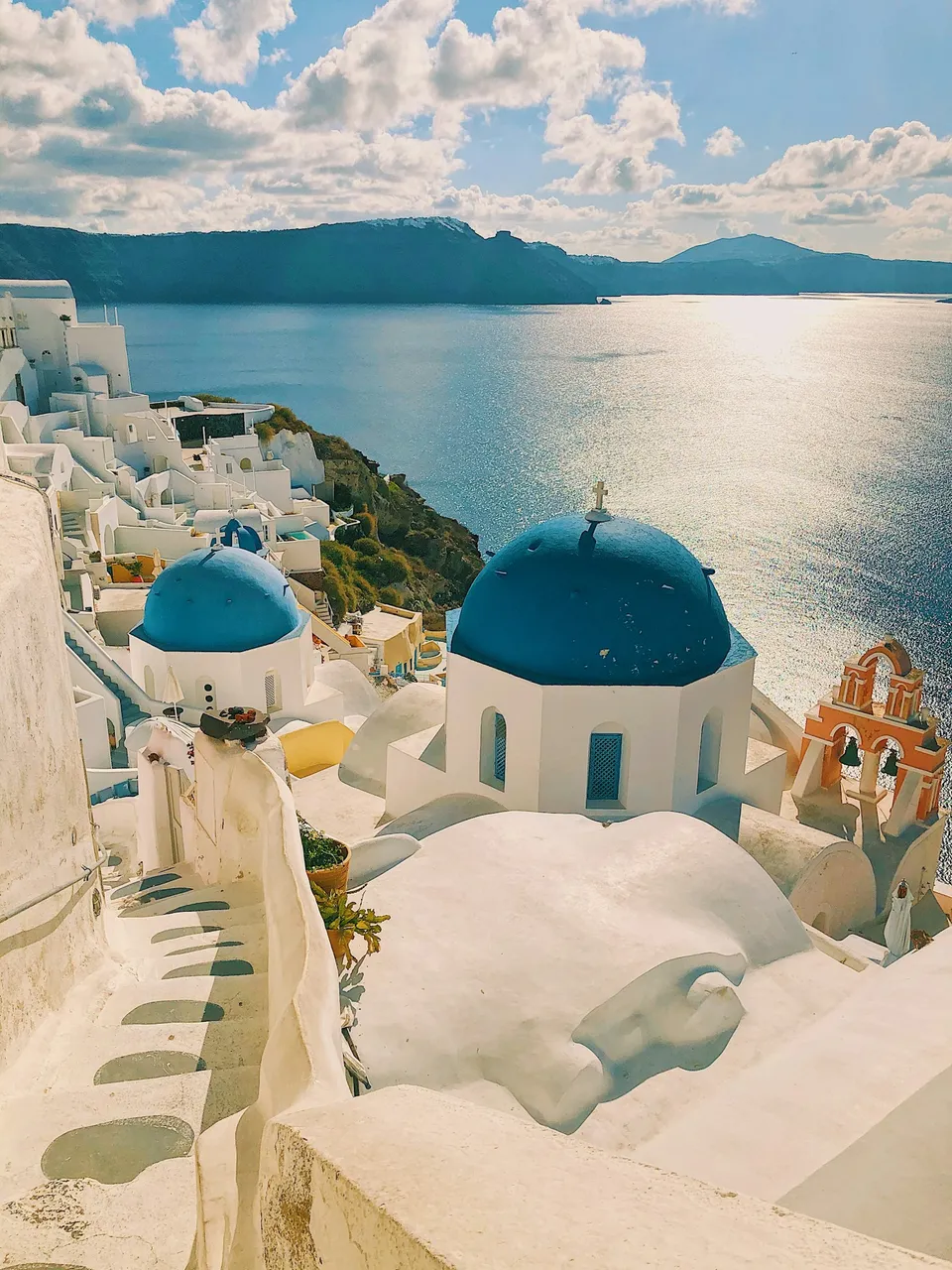 Whitewashed houses and blue domes overlooking the sea in Santorini
